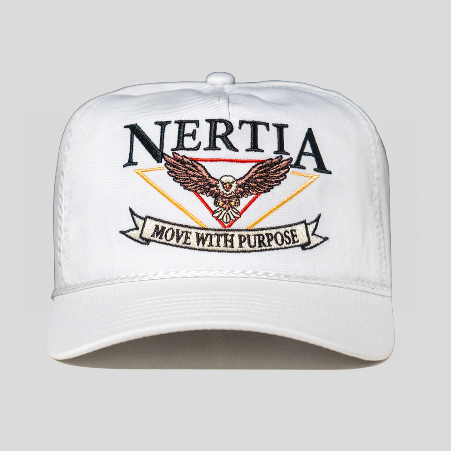 White cap with Nertia logo and eagle design on a gray background