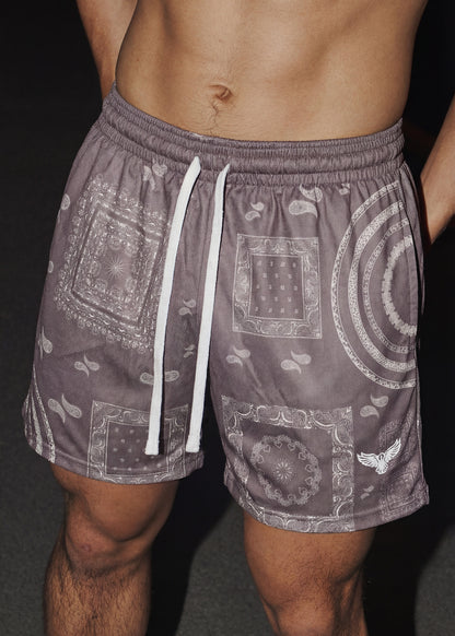 Patterned shorts with a drawstring on a dark background