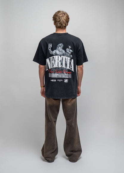 Person wearing a black t-shirt with a graphic design on the back, standing against a plain background