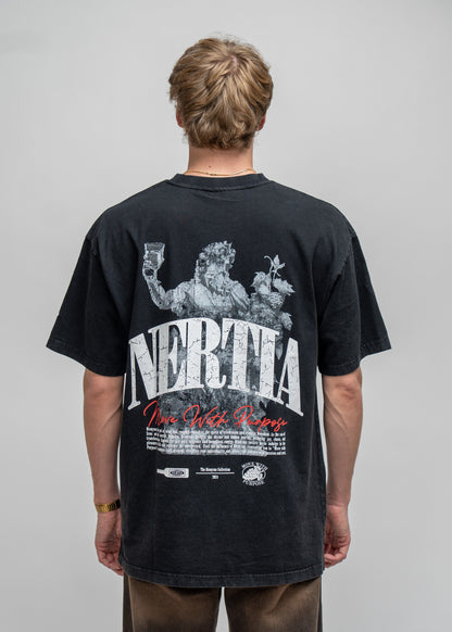 Person wearing a black t-shirt with a graphic design and text on the back, standing against a plain background.