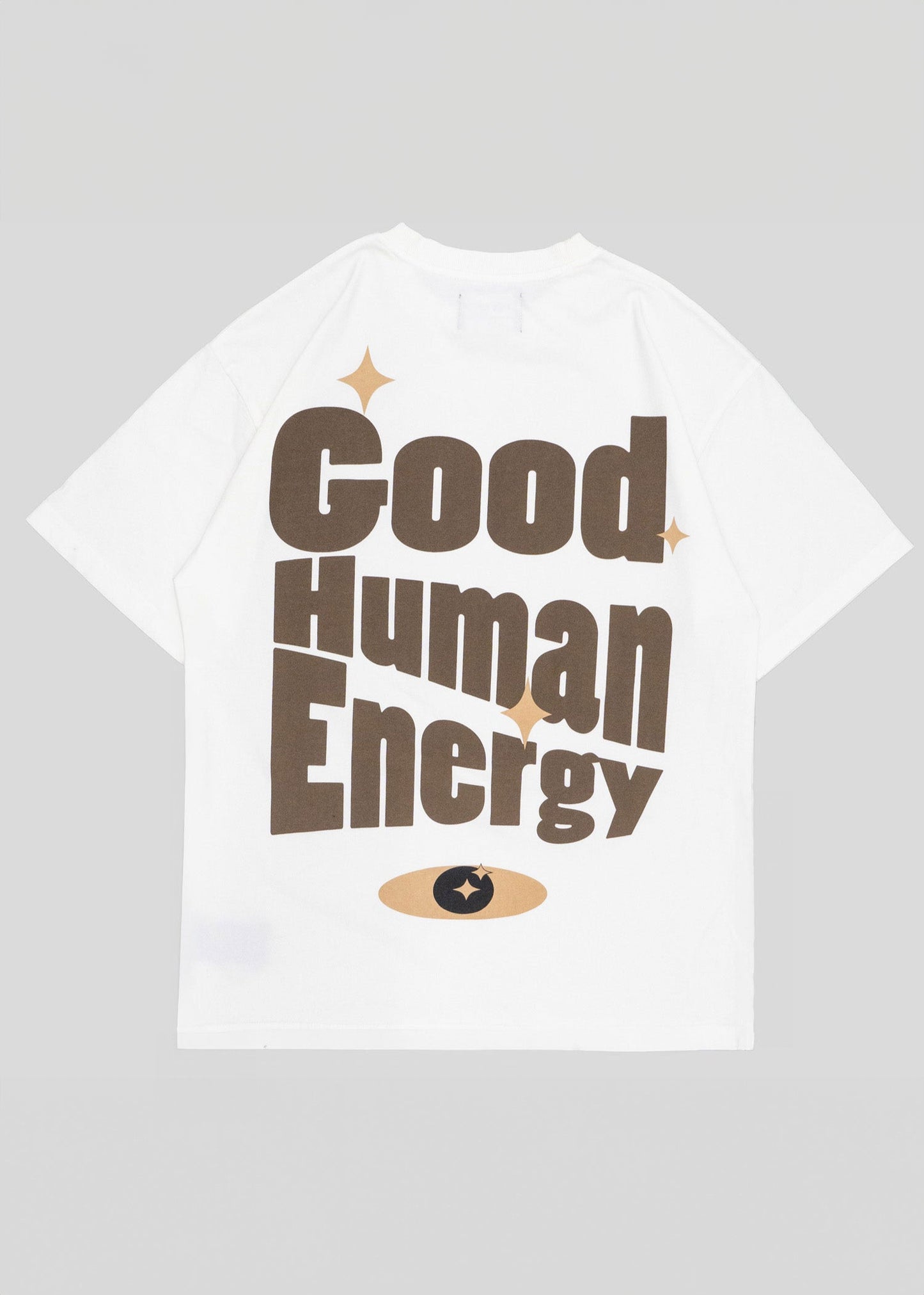 White t-shirt with 'Good Human Energy' text on a gray background
