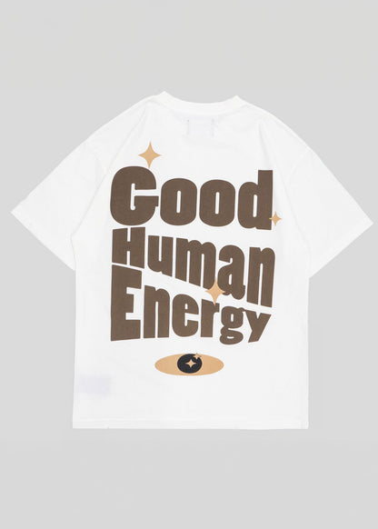 White t-shirt with 'Good Human Energy' text on a gray background