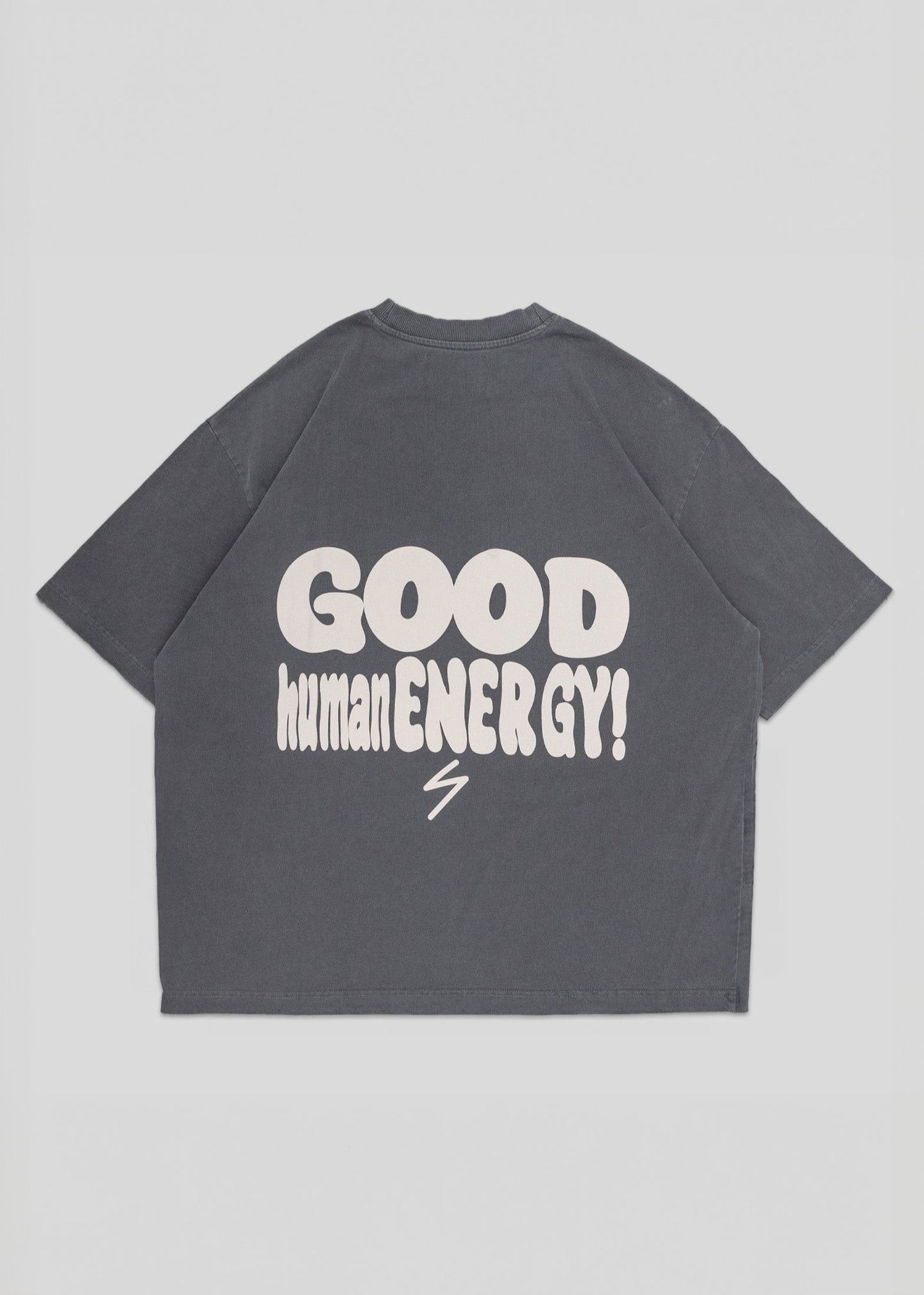 Gray t-shirt with 'GOOD human ENERGY!' text on the back against a light gray background