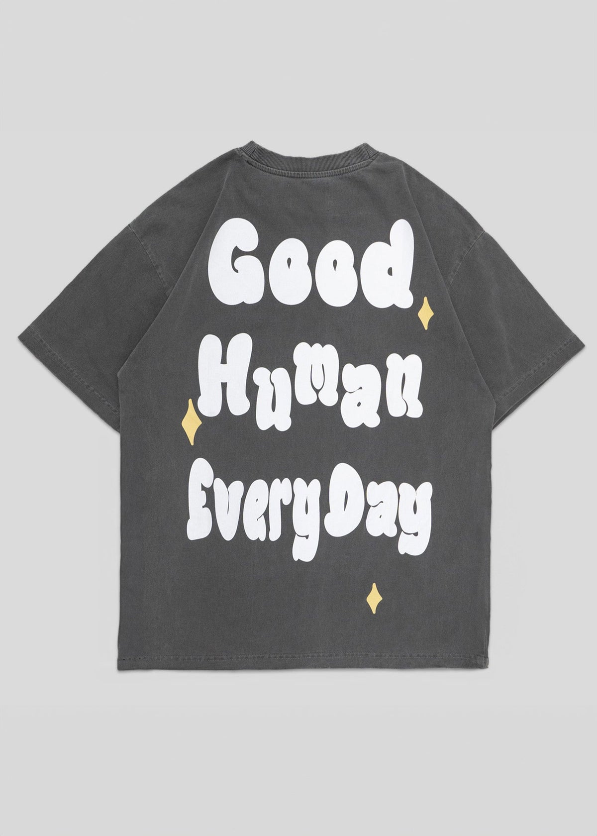Gray t-shirt with 'Good Human Every Day' text on a gray background