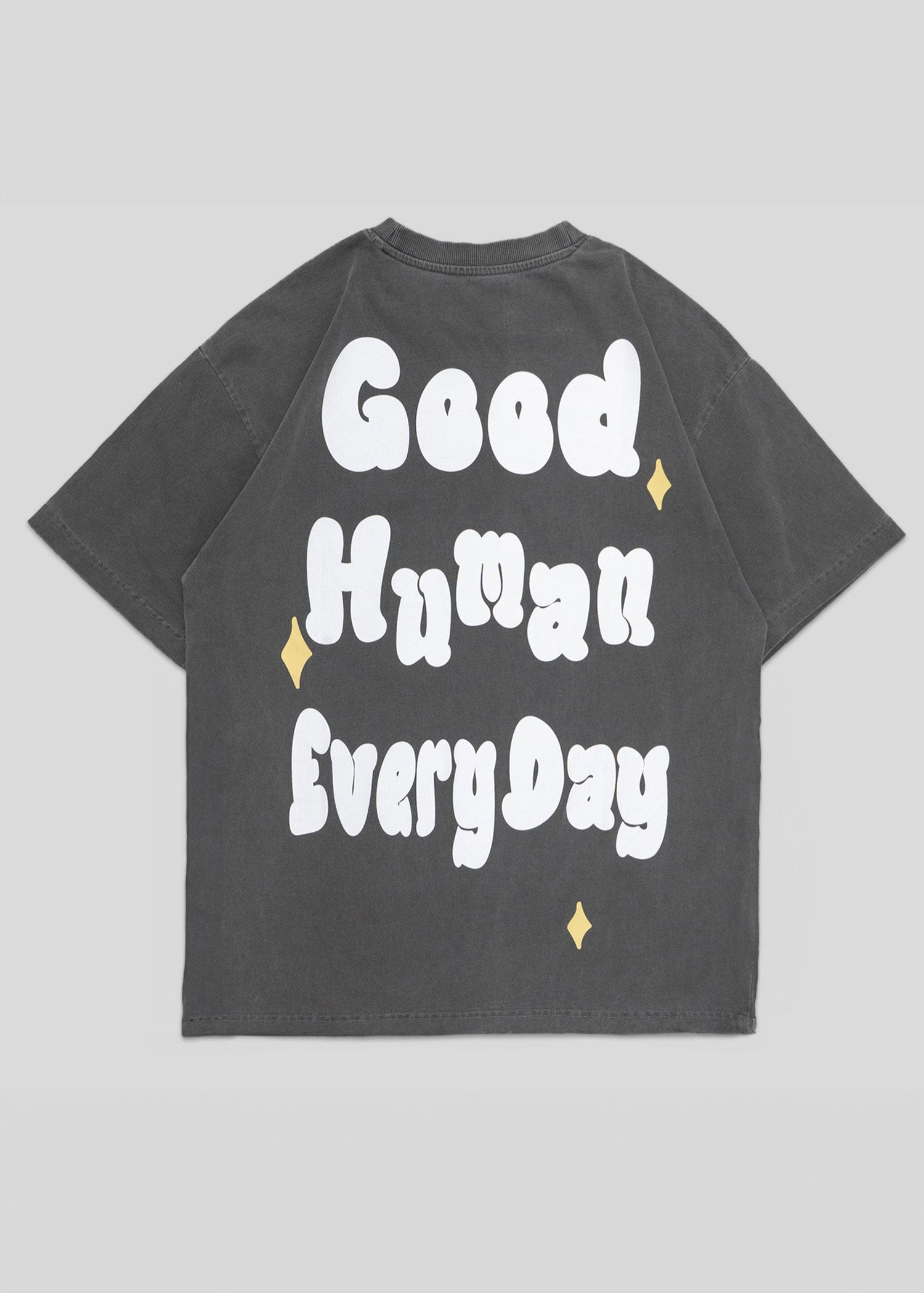 Gray t-shirt with 'Good Human Every Day' text on a gray background