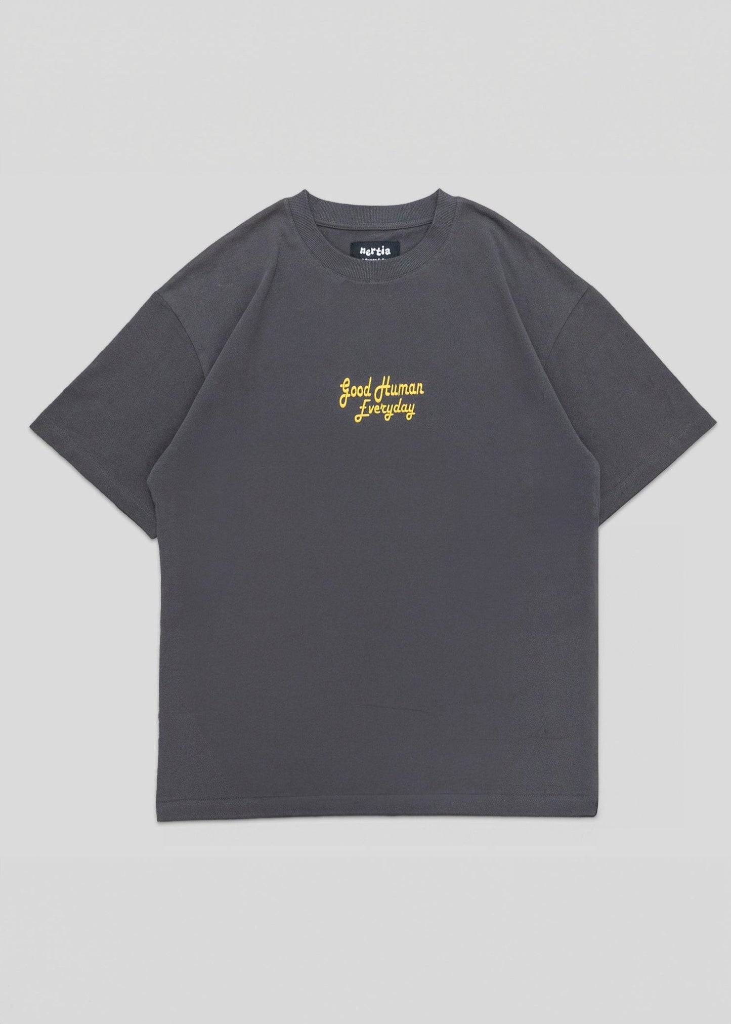 Gray t-shirt with yellow text on a light gray background