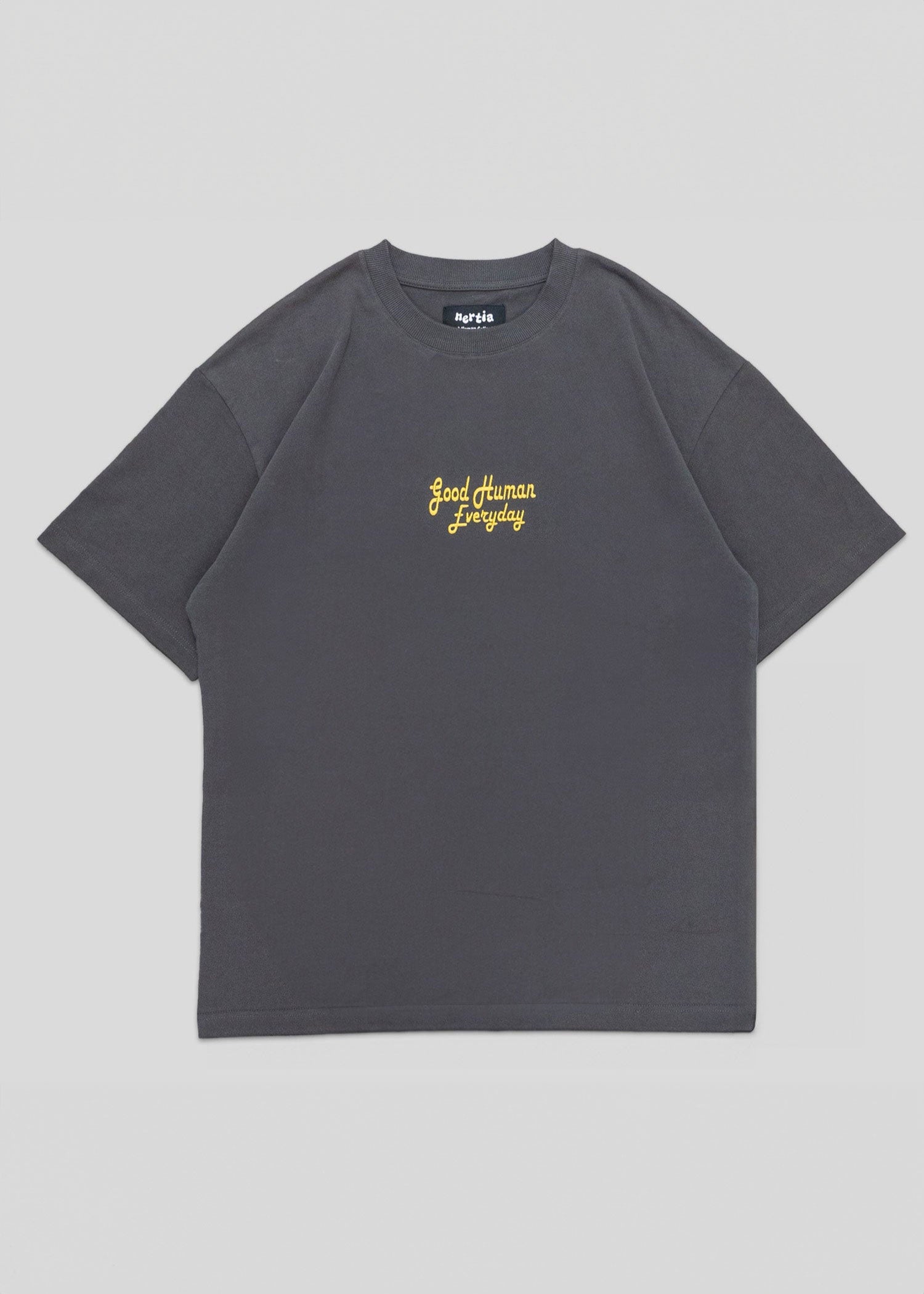 Gray t-shirt with yellow text on a light gray background