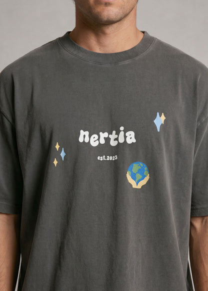Person wearing a dark gray t-shirt with 'nertia' branding and graphics.