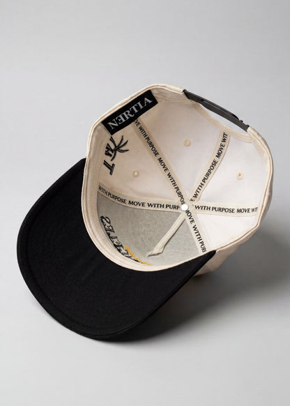 A black and off-white structured baseball cap shown from an overhead angle, revealing the interior branding with 'WITH PURPOSE' and 'MOVE WITH PURPOSE' printed repeatedly on the brim and crown.