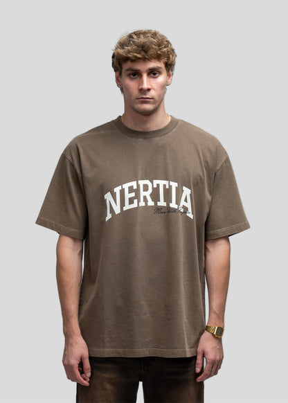 Man wearing a brown 'Nertia' t-shirt against a gray background