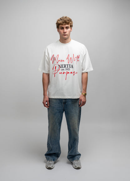Person wearing a white t-shirt with text on a gray background