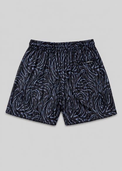 Black patterned shorts on a gray background