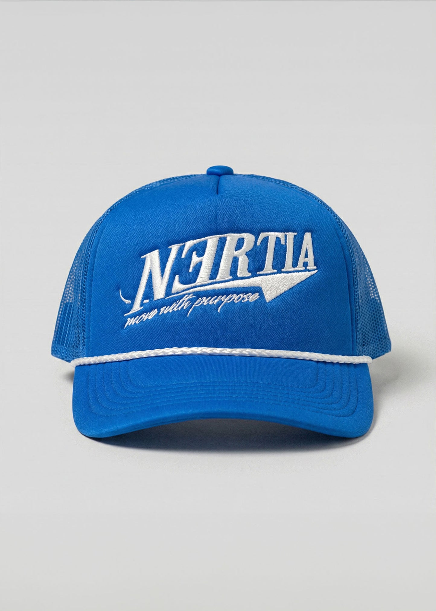 Blue cap with white mesh back and branding on a light gray background