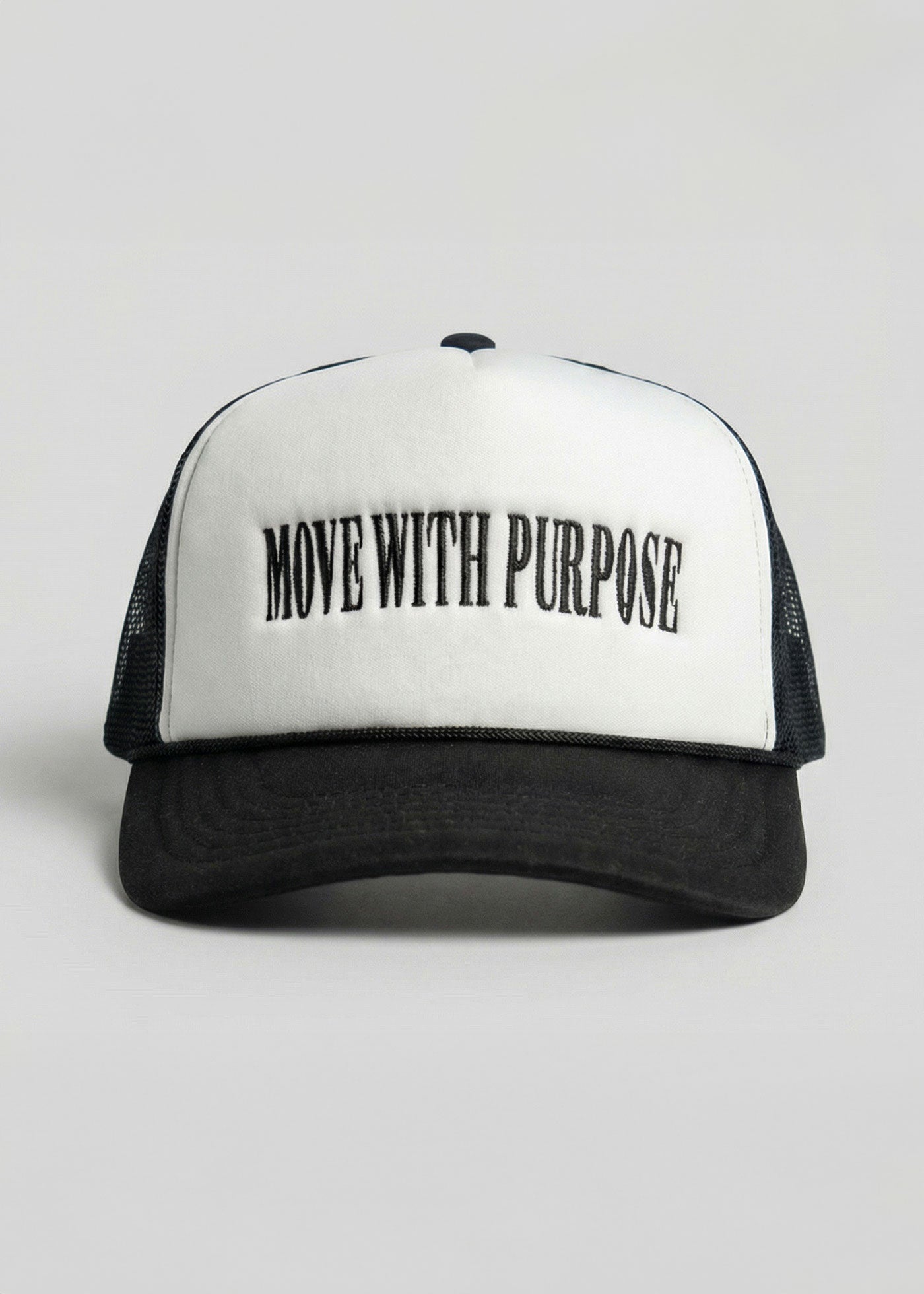 Black and white cap with 'Move with Purpose' text on a light gray background