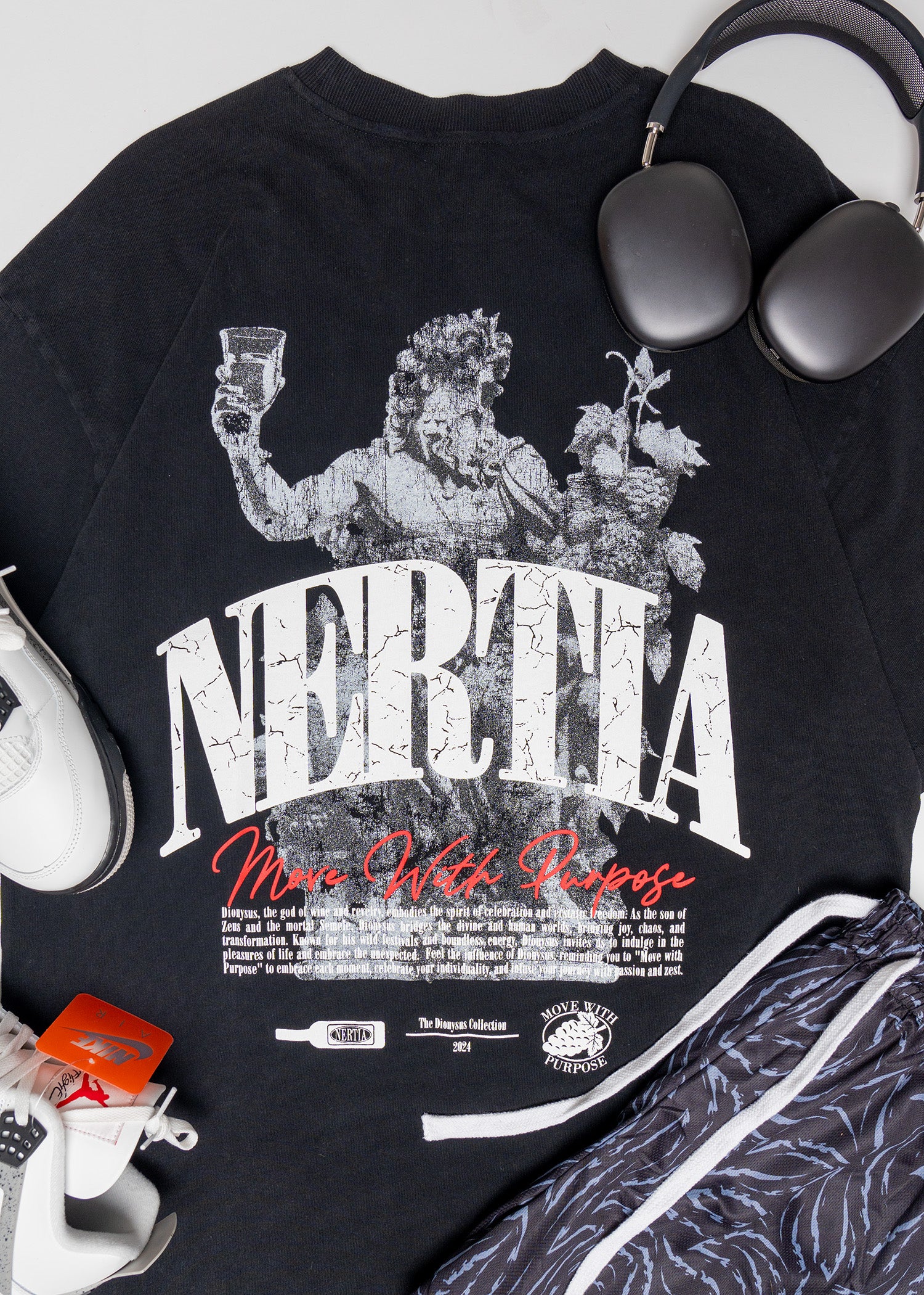 Black t-shirt with 'Neretta' graphic design on a white surface